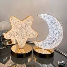 Shining star and moon decorative ornaments for home decor and celebrations.